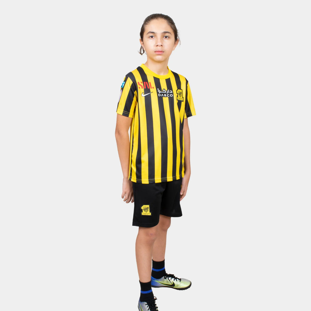 Al Ittihad Fc Kids Kit Home Season 23/24 Designed By Mitani Store , Regular Fit Jersey Short Sleeves And Round Neck Collar In Yellow Color